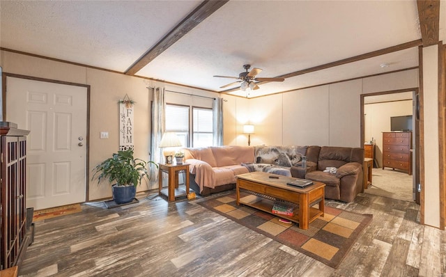 living room with ceiling fan, a textured ceiling, crown molding, and dark hardwood / wood-style flooring