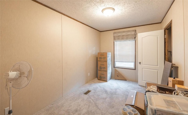 interior space featuring a textured ceiling