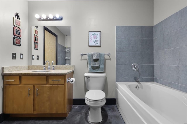 bathroom with a bathing tub, toilet, and vanity