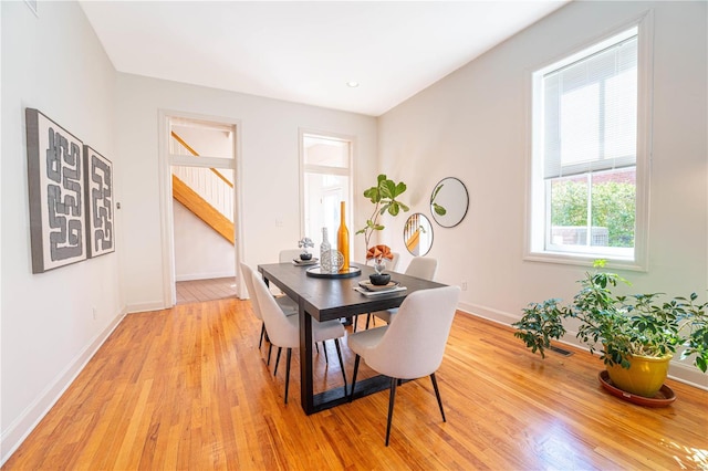 dining room with light wood-type flooring