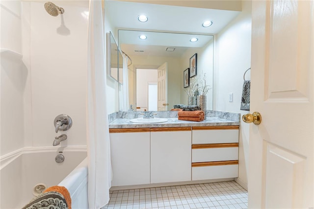 bathroom featuring shower / tub combo, tile patterned flooring, and vanity