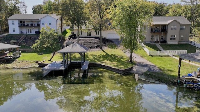 dock area featuring a gazebo and a water view