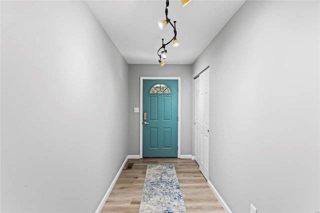 doorway to outside with light hardwood / wood-style flooring