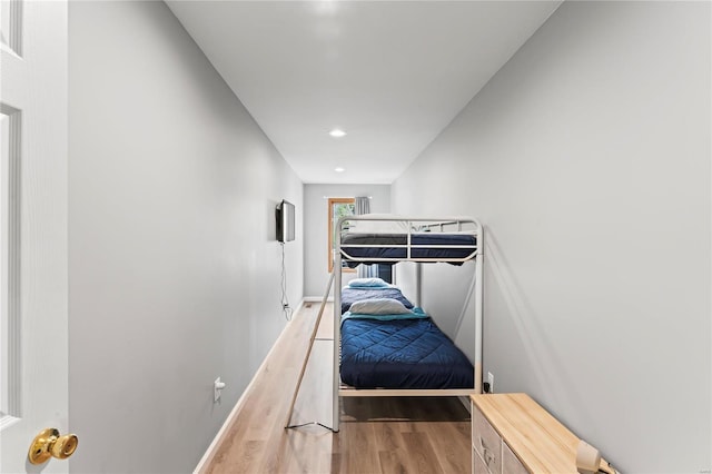 bedroom with wood-type flooring