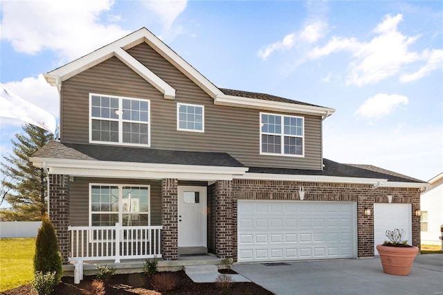 view of front of home featuring a garage and covered porch