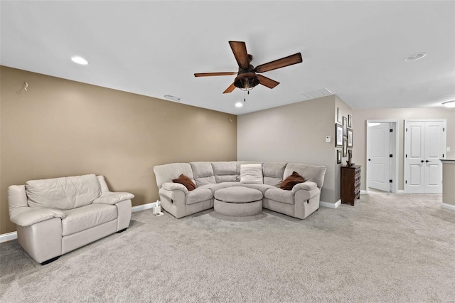 living area with recessed lighting, carpet, and baseboards