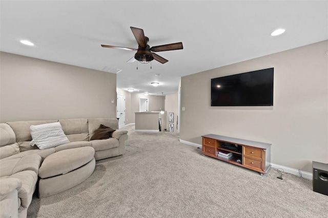 living area featuring recessed lighting, ceiling fan, baseboards, and carpet floors