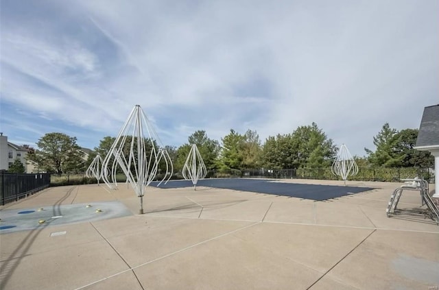 exterior space with a patio and fence