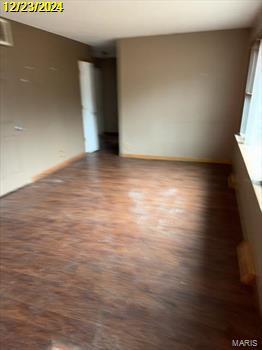 empty room featuring wood finished floors