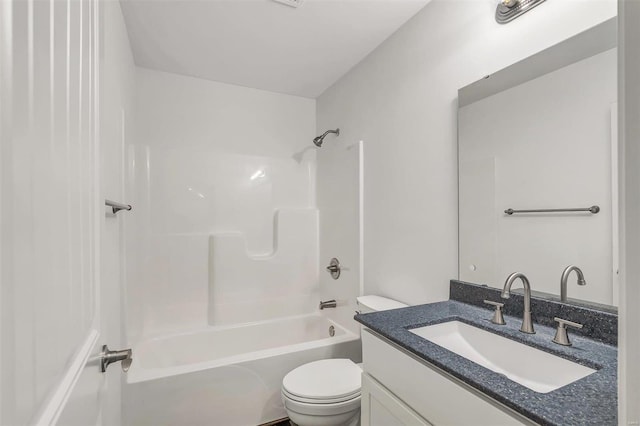 full bathroom featuring  shower combination, vanity, and toilet