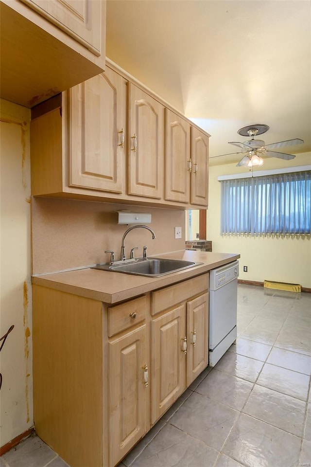 kitchen with ceiling fan, light brown cabinets, sink, and white dishwasher