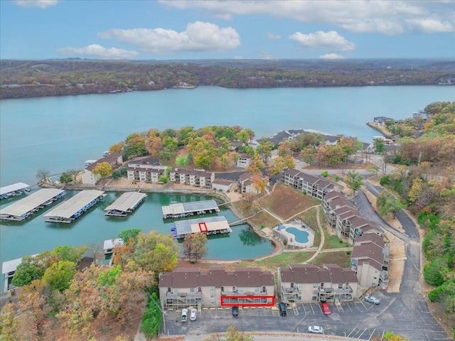 birds eye view of property featuring a water view