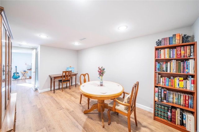 dining room featuring light hardwood / wood-style floors