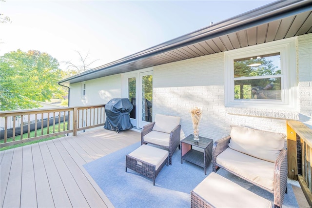 wooden terrace with area for grilling