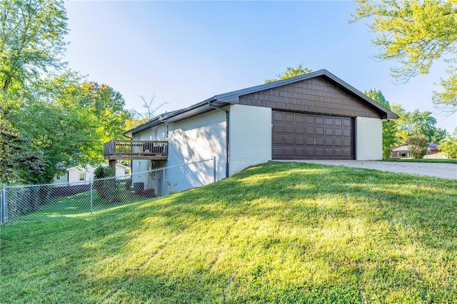 garage with a lawn