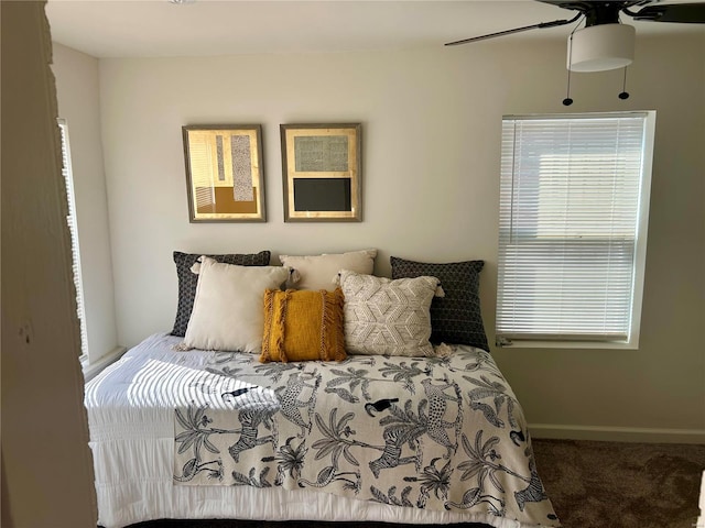 bedroom featuring carpet floors and ceiling fan