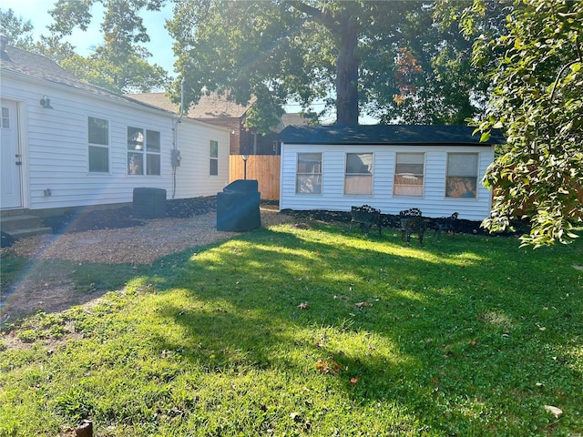 view of yard with central AC