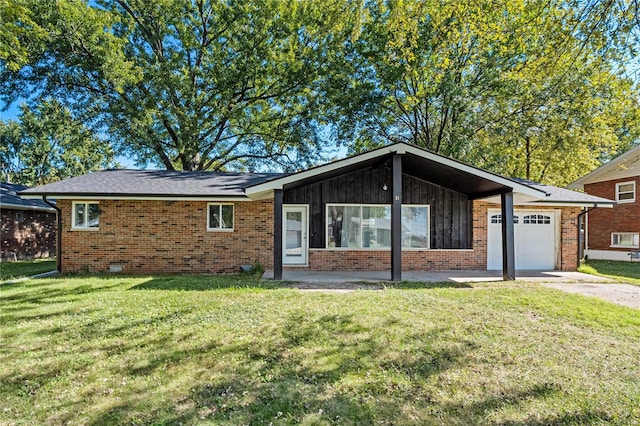 ranch-style house with a garage, concrete driveway, brick siding, and a front lawn