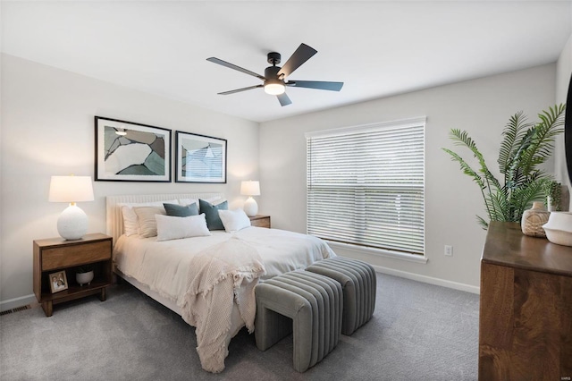 carpeted bedroom with ceiling fan