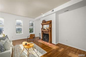 living room featuring dark hardwood / wood-style floors