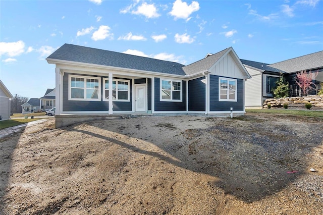 ranch-style home with board and batten siding