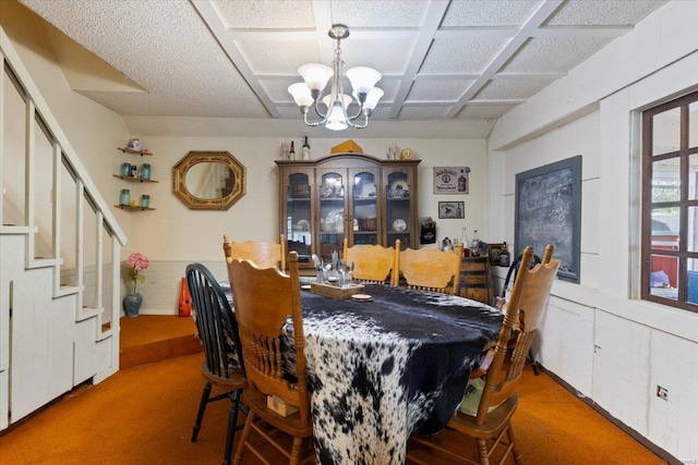 dining space with a notable chandelier