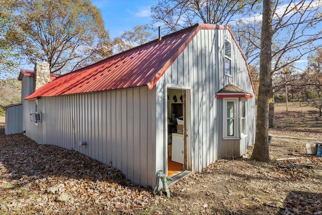 view of outbuilding with cooling unit