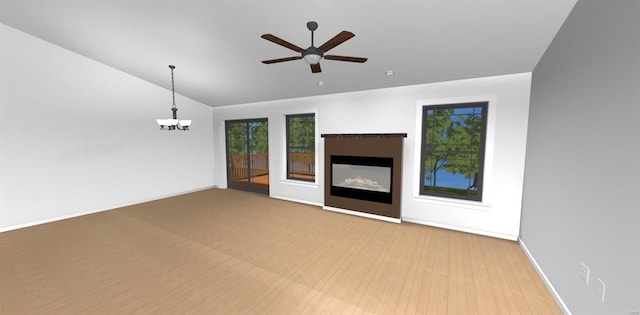 unfurnished living room featuring ceiling fan with notable chandelier and light wood-type flooring