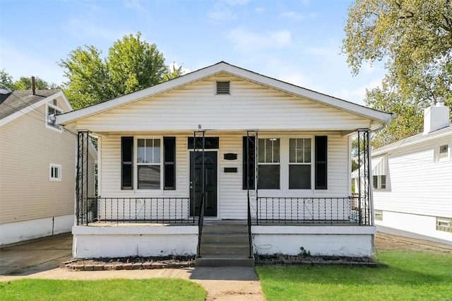 bungalow-style home with a porch