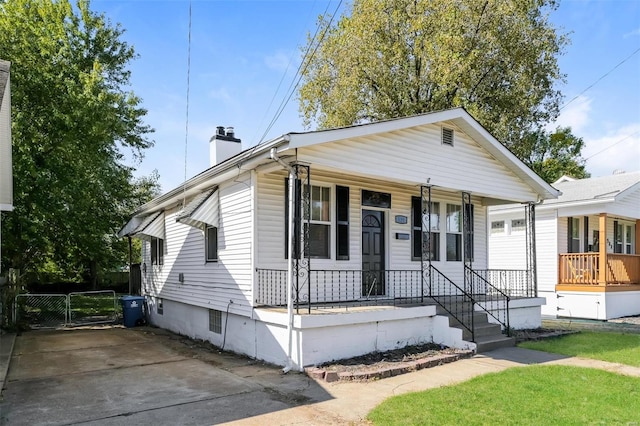 bungalow-style home featuring a porch