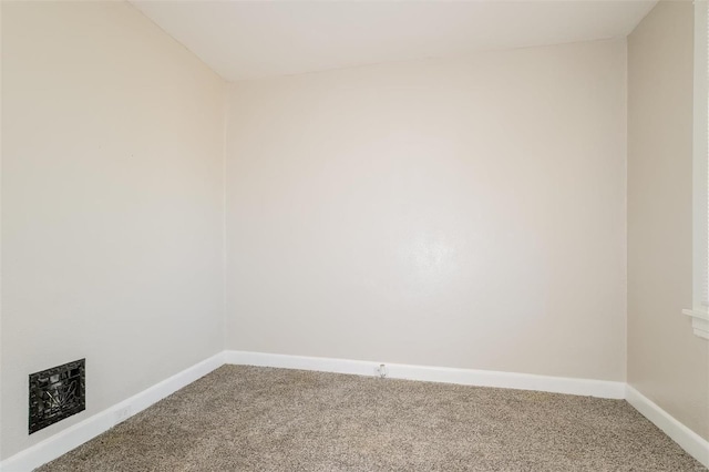 unfurnished room featuring carpet flooring