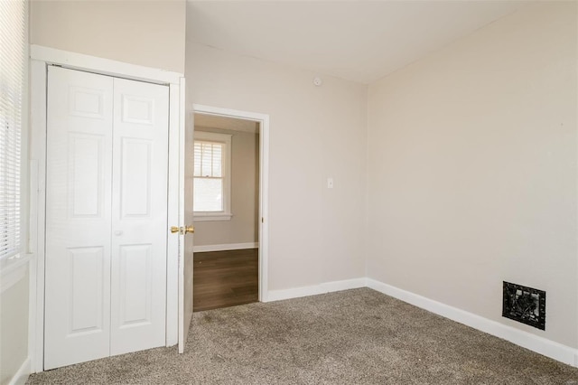 spare room featuring carpet flooring