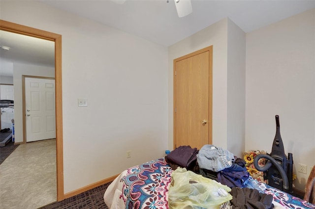 carpeted bedroom featuring ceiling fan