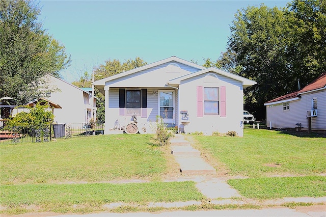 view of front of home featuring a front lawn