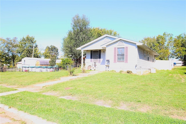 view of front of property with a front lawn