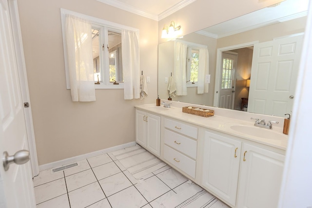 bathroom with vanity, crown molding, and tile patterned floors