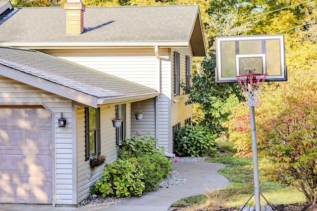 view of property exterior with a garage