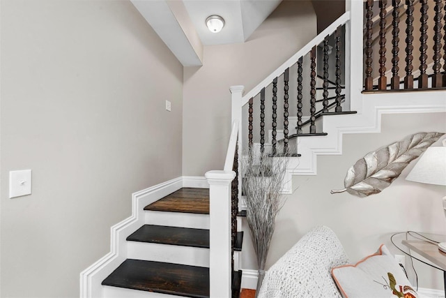 stairs with baseboards