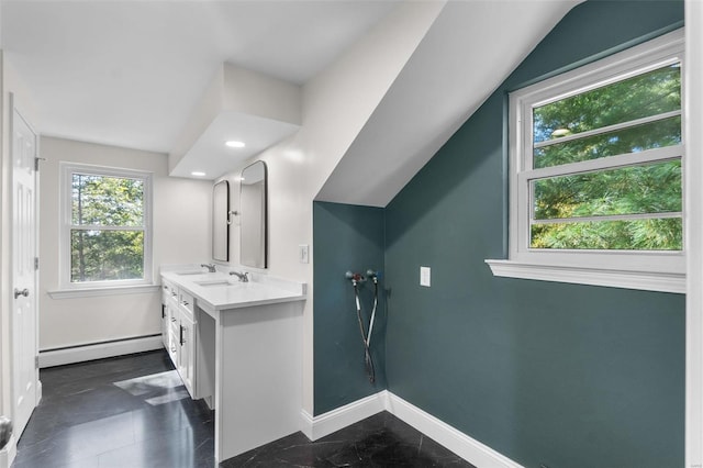 bathroom with vanity, baseboard heating, vaulted ceiling, and a shower