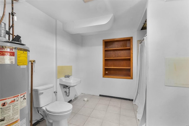 bathroom with water heater and toilet