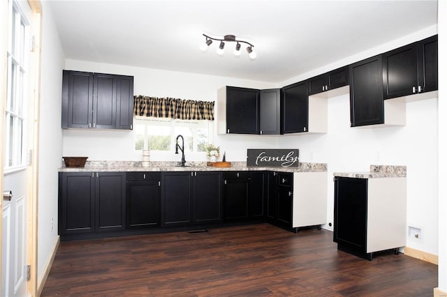 kitchen featuring dark hardwood / wood-style floors and sink