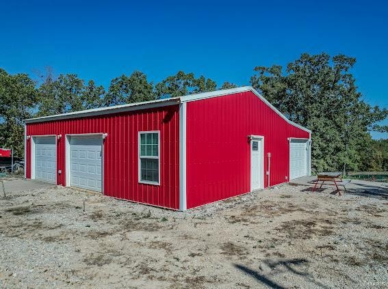 view of outdoor structure with a garage