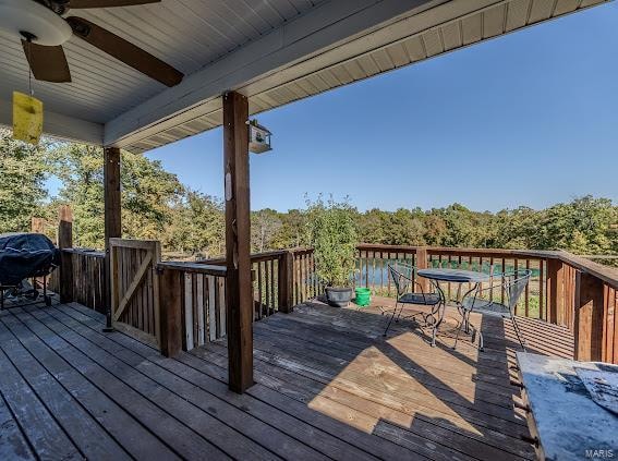 wooden deck with ceiling fan