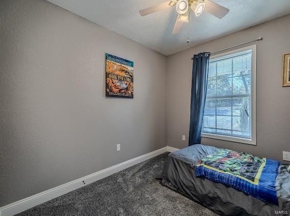 bedroom featuring carpet floors and ceiling fan