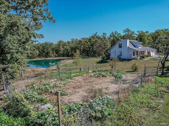 view of yard with a water view