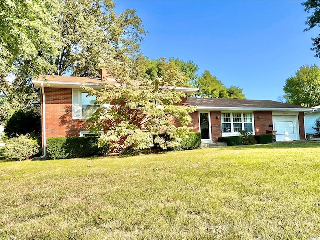 split level home with a front yard