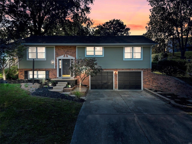 bi-level home featuring a garage