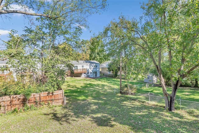 view of yard featuring a deck