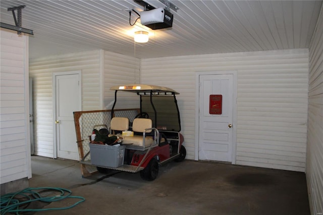 garage featuring a garage door opener