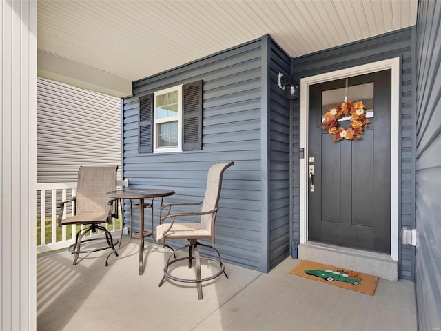 doorway to property with a porch